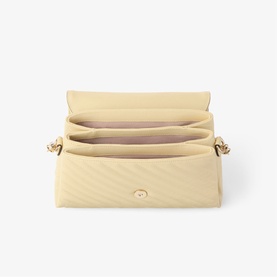 Curve Quilted Top Handle Bag