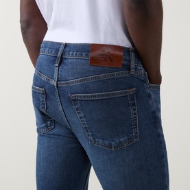 Mid-Rise Tapered Slim Leg Jeans