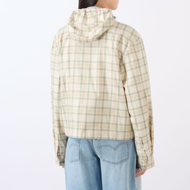 Model wearing Acne green/orange check cotton hooded jacket, rear view, styled with light blue denim jeans