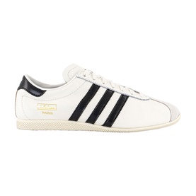 Adidas trainer in core white and core black, three-stripe detail, gold branding, cream rubber sole, low-top leather upper.