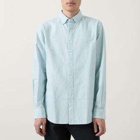 Model wearing Rodd & Gunn Cambridge Oxford Shirt in Fern, featuring button-down collar, long sleeves, and front button placket