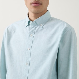 Model wearing Rodd & Gunn Cambridge Oxford Shirt in Fern, featuring button-down collar and front button placket. 100% cotton.