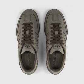 Adidas trainers in clay shadow olive gum, overhead view showing tonal laces, three-stripe detail and gum sole.