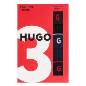 Hugo Three-Pack Fashion Trunk Boxers in black, shown in branded red retail packaging with triple G logo tabs visible