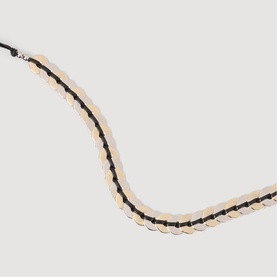 Sandro Coin Chain Woven Belt in black, featuring gold-tone disc coins interwoven with black leather cord detailing.