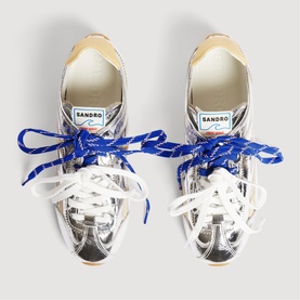 Sandro Light Wave Leather Low-Top Trainers in silver metallic, blue and white laces, rubber sole, top-down view showing embroidered logo tongue