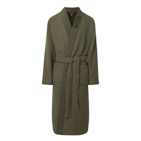 Hugo Boss Logo Waffle Robe in green with shawl lapel, self-tying belt, slip pockets, and tonal logo detail