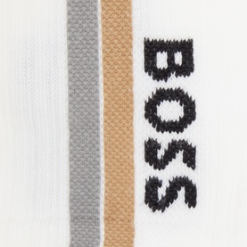 Hugo Boss white cotton-blend socks multipack, close-up showing grey, tan and black vertical stripes with embroidered BOSS logo.