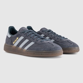 Adidas Handball Spezial trainers in Aurora Onix with Halo Silver stripes, suede upper, gold branding, and gum rubber sole.