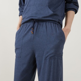 Model wearing Paul Smith Access Harry Lounge Sweatpants in blue, slim-leg fit with elasticated drawstring waist and patch pockets, styled with