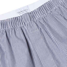 Sunspel Classic Pinstripe Boxer Shorts in white, navy and light blue pinstripe, showing elasticated waistband and soft cotton fabric detail.