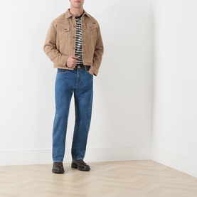 Model wearing Seven Jeans Kingfisher straight jeans, styled with a camel suede jacket, striped top and dark loafers.
