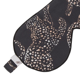 Desmond & Dempsey navy cotton eye mask with leopard print design, small branded label on elastic strap, flat lay view