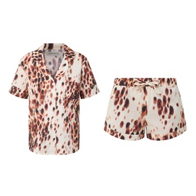 Desmond & Dempsey Leopard Top & Shorts Pyjama Set in leopard brown, featuring notched collar shirt and drawstring shorts in cotton