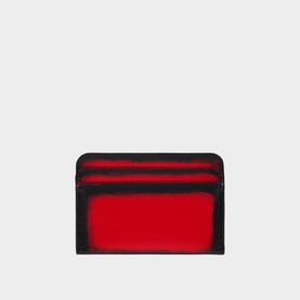 Christian Louboutin red and black leather card holder with signature red interior lining, slim multi-slot design