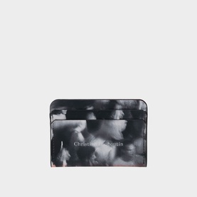Christian Louboutin card holder in black and white abstract print with silver logo lettering, flat card slot design