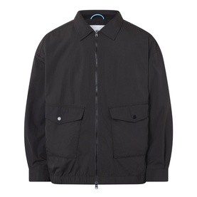 Edwin Chaos Water-Resistant Jacket in black with flat collar, zip fastening, patch pockets, and elasticated hemline