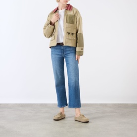 Model wearing Paige Mason Mid-Rise Ankle Straight Leg Jeans in Monaco Mist, styled with a beige utility jacket and taupe loafers.