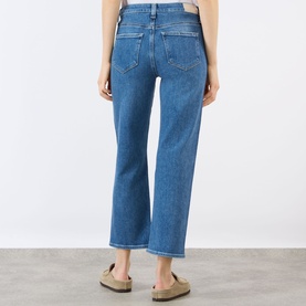 Model wearing Paige Mason Mid-Rise Ankle Straight Leg Jeans in Monaco Mist, rear view showing logo badge, belt loops and cropped straight leg.
