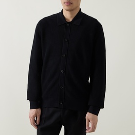 Model wearing Boss Black Casual Laconico Knitted Polo Cardigan in black, with polo collar, button front, and ribbed trims