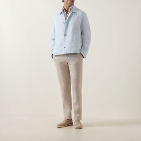 Model wearing Boss Black Casual Open Blue linen-lyocell casual jacket with beige trousers and tan suede loafers.