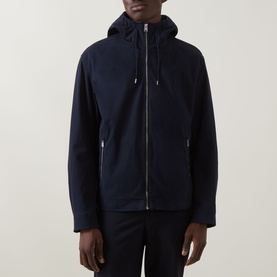 Model wearing Boss Black Casual dark blue casual jacket with hood, zip fastening, and side zip pockets, styled with matching trousers.