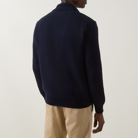 Model wearing Boss Black Casual dark blue casual jacket, back view, styled with beige trousers