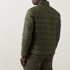 Model wearing Boss Black Casual Open Green quilted casual jacket, back view, styled with khaki trousers
