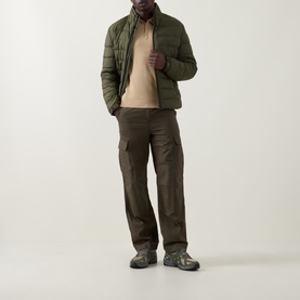 Model wearing Boss Black Casual Open Green quilted casual jacket, styled with brown cargo trousers and grey hiking boots.