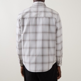 Model wearing Boss Black Casual Owen Flap Pocket Check Shirt in Open White, rear view showing check print, long sleeves, and buttoned cuffs