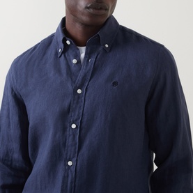 Model wearing Boss Black Casual Liam Logo Linen Shirt in dark blue, with button-down collar and small embroidered logo at chest.