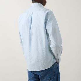 Model wearing Boss Black Casual Open Blue cotton casual shirt, rear view, styled with mid-blue denim jeans