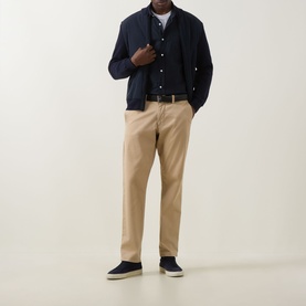 Model wearing Boss Black Casual dark blue cotton casual shirt, styled with navy cardigan, beige chinos and navy shoes.