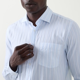Model wearing Boss Black Casual Rob Striped Shirt in Open Blue, close-up showing tonal stripe detail, chest pocket and button placket