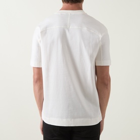 Model wearing Boss Black Casual Taut Logo T-Shirt in Open White, back view, round neck, short sleeves, straight hemline, 100% cotton.