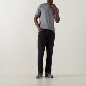 Model wearing Boss Black Casual Thompson Logo T-Shirt in Open Grey, crew neck, short sleeves, styled with black jeans and grey trainers.