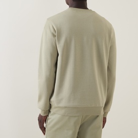 Model wearing Boss Black Casual C-Sharpe Logo Sweatshirt in dark beige, crew neck, ribbed cuffs and hem, back view, styled with matching trousers