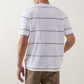 Model wearing Boss Black Casual Tigerman Stripe T-Shirt in white with navy stripes, back view, paired with khaki trousers
