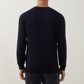 Model wearing Boss Black Casual Leno Knitted Sweater in dark blue, rear view showing crew neck, long sleeves and ribbed trims