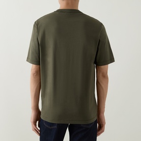 Model wearing Boss Black Casual H-Taut Logo T-Shirt in Open Green, rear view, crew neck, short sleeves, styled with dark jeans