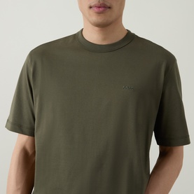 Model wearing Boss Black Casual H-Taut Logo T-Shirt in Open Green, crew neck, dropped shoulders, with tonal logo detail on chest