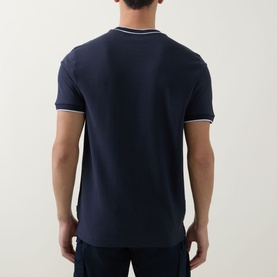 Model wearing Boss Black Casual Thompson Tipped T-Shirt in dark blue, rear view showing tipped trims on collar and short sleeves