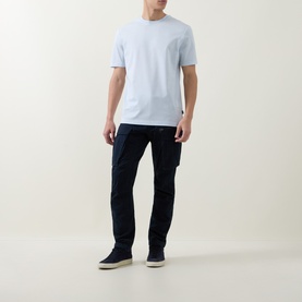 Model wearing Boss Black Casual Open Blue cotton crew neck T-shirt, styled with navy cargo trousers and navy suede trainers.
