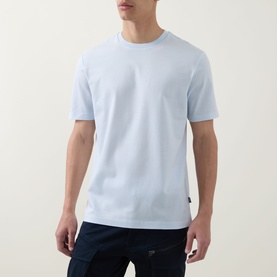 Model wearing Boss Black Casual Open Blue crew neck cotton T-shirt, styled with dark navy trousers