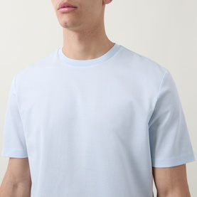 Model wearing Boss Black Casual Crew Neck T-Shirt in Open Blue, 100% cotton, cropped view showing chest and neckline detail