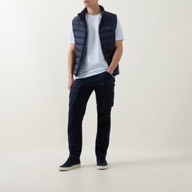 Model wearing Boss Black Casual Open Blue crew neck T-shirt, styled with navy quilted gilet, dark jeans and navy suede trainers.