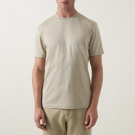 Model wearing Boss Black Casual Thompson Logo T-Shirt in Dark Beige, crew neck, short sleeves, textured finish, styled with matching shorts