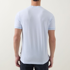 Model wearing Boss Black Casual Thompson Tipped T-Shirt in Open Blue, rear view showing tipped trims and split side seams