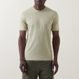 Model wearing Boss Black Casual Thompson Logo T-Shirt in dark beige, crew neck, short sleeves, styled with olive cargo trousers.