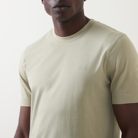 Model wearing Boss Black Casual Thompson Logo T-Shirt in dark beige, crew neck with embroidered logo, short sleeves, 100% cotton